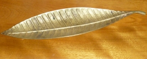A leaf of brass.
